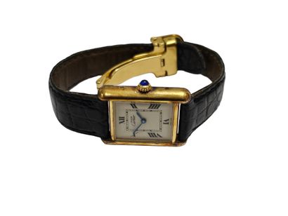 Must de CARTIER 
Bracelet montre de dame...