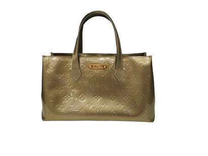 LOUIS VUITTON WILSHIRE
Green patent leather...