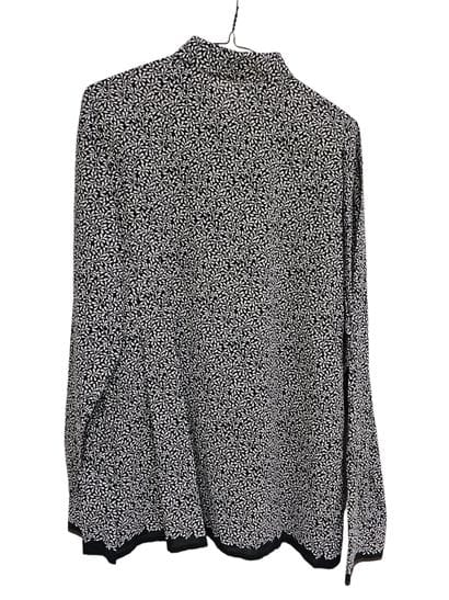 HERMES
Chemise noire à motif floral
Chemise...