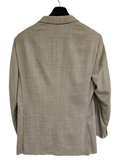 HERMES
Veste grise à carreaux
Taille 54
T-shirt...