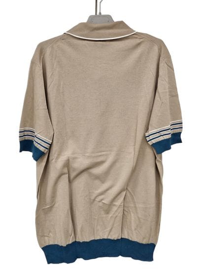 Versace
Polo bleu marine
Hermes
Pull en cachemire...