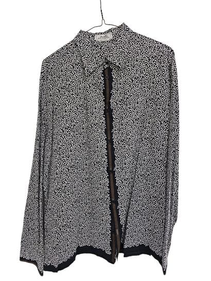 HERMES
Chemise noire à motif floral
Chemise...