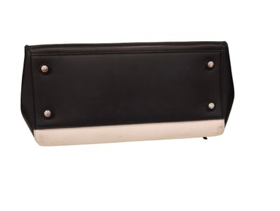 CELINE Paris Edge bag
Black and white leather...