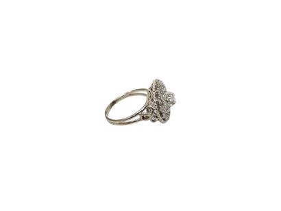 Gold and platinum daisy ring set with diamonds...