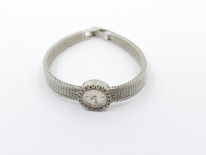 OMEGA 
Montre bracelet de dame en or gris...