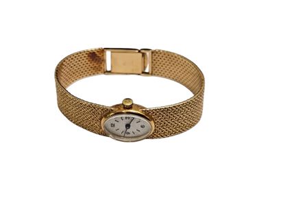 MONTRE BRACELET de dame en or jaune 750°,...