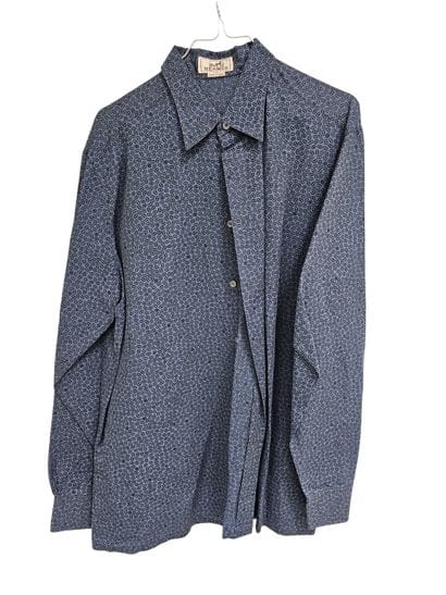 HERMES
Chemise bleue à motif de labyrinthe
Chemise...