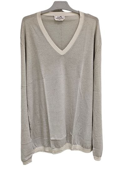 HERMES
Pull en cachemire beige
Taches
T-shirt...