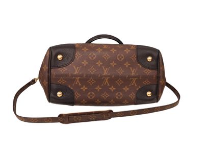 LOUIS VUITTON Estrela
Brown and black leather...