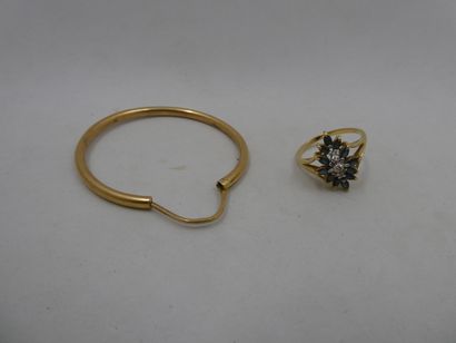1 Buckle 18kt Gold 4,55g 1 Ring 18kt Gold...