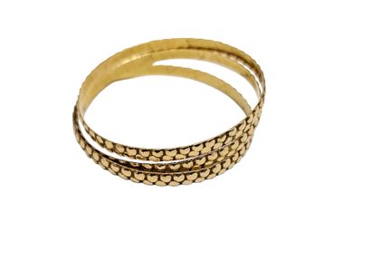 TROIS BRACELETS en or jaune 750° 
Poids :...