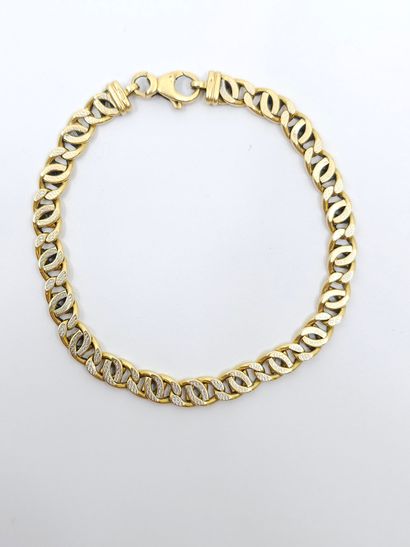 BRACELET en or deux tons 750° 
Poids : 10,44...