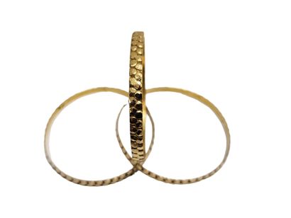 TROIS BRACELETS en or jaune 750° 
Poids :...