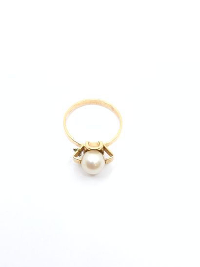 BAGUE DE JEUNE FILLE en or jaune 750° ornée...