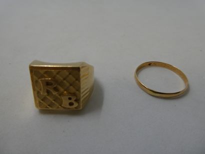 1 Ring 18kt Gold 10,83g 1 Wedding Band 18kt...