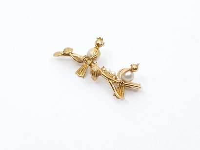 FRENCH WORK
Charming brooch in yellow gold...