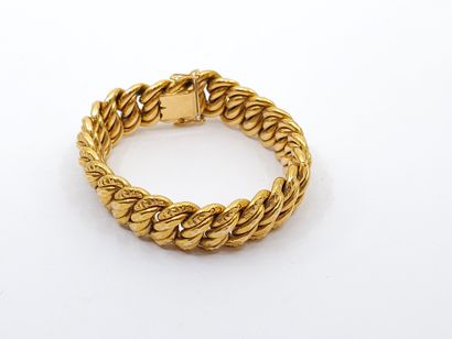 BRACELET maille américaine en or jaune 750°...