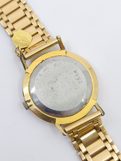 BAUME ET MERCIER Bracelet watch in 750° yellow...
