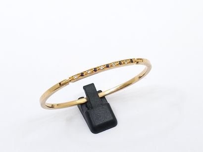 BRACELET in yellow gold 750° line of diamonds...