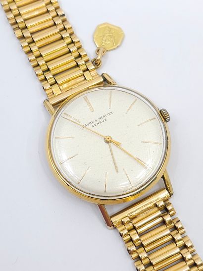 BAUME ET MERCIER Bracelet watch in 750° yellow...
