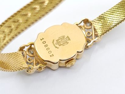 LIP
Ladies' wristwatch in 750° yellow gold...
