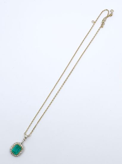 750° yellow gold CHAIN accompanied by a gold...