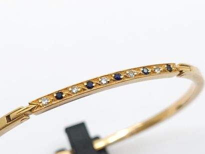BRACELET in yellow gold 750° line of diamonds...