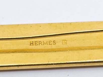 HERMES
Enameled gilt metal brooch with bit...
