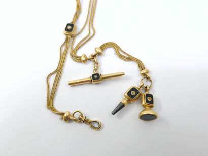 CHATELAINE in 750° yellow gold, onyx and...