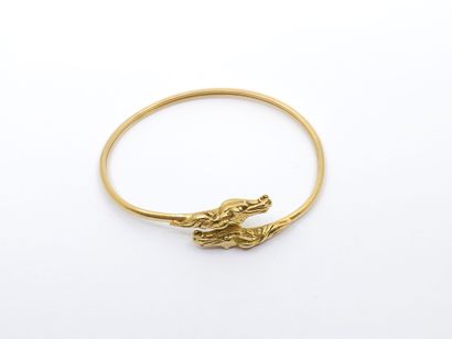 BRACELET in yellow gold 750° ending in two...