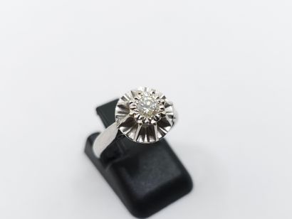 BAGUE en or gris 750° ornée d'un diamant...