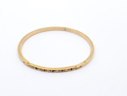 BRACELET in yellow gold 750° line of diamonds...