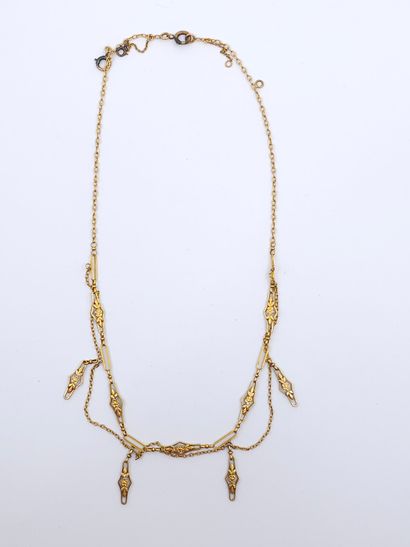 COLLIER colerette en or jaune 750° à décor...