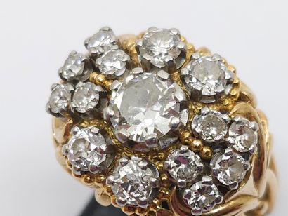 IMPORTANTE bague en or deux tons 750° ornée...