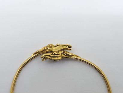 BRACELET in yellow gold 750° ending in two...