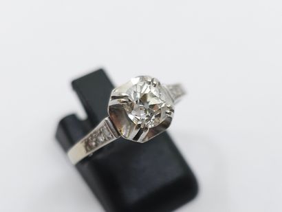 FRENCH WORK 
RING in 750° gold and platinum...