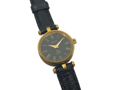 GUCCI
Ladies' wristwatch, round dial, black...
