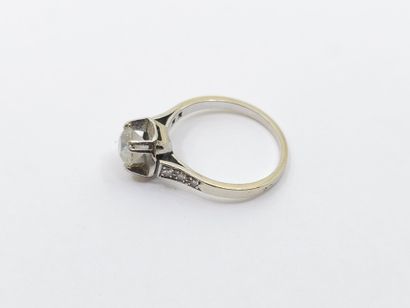 FRENCH WORK 
RING in 750° gold and platinum...