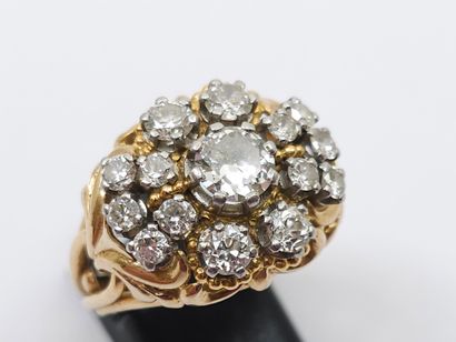 IMPORTANTE bague en or deux tons 750° ornée...