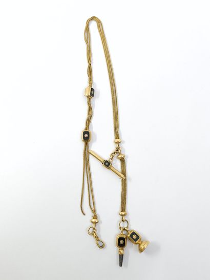 CHATELAINE in 750° yellow gold, onyx and...