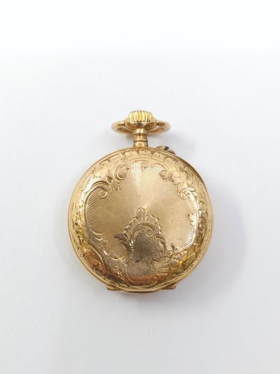 NECK WATCH in finely chased 750° pink gold
Gross...