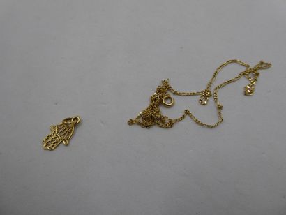 1 Chain 18kt Gold 2,00g 1 Pendant 18kt Gold...