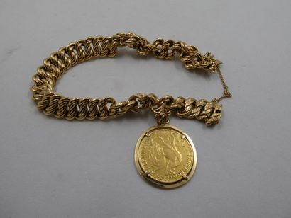 1 Bracelet 18kt Gold 21,56g and a coin motif...