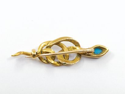 BROCHE serpent en or jaune 750° surmontée...