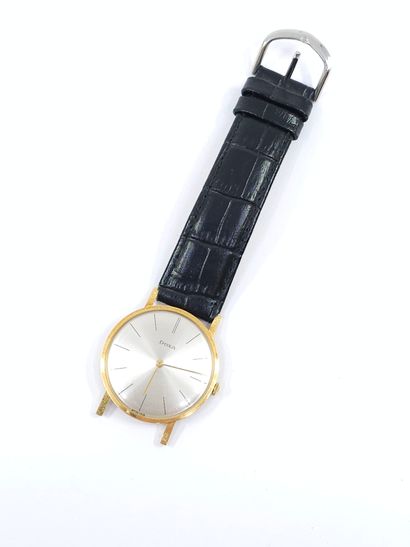 DOXA
Montre bracelet, boîtier rond en or...