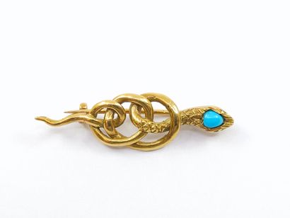BROCHE serpent en or jaune 750° surmontée...