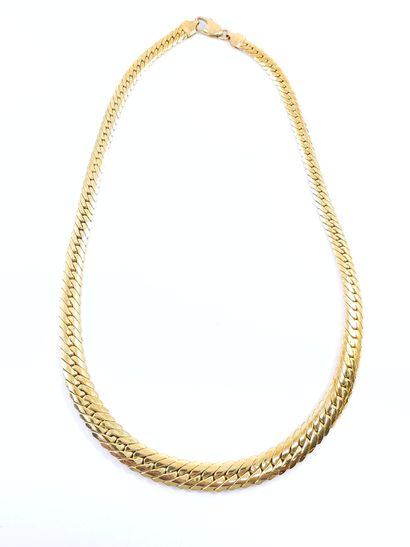 COLLIER ET BRACELET maille palmier en or...