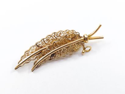 TRAVAIL ETRANGER 
BROCHE en or jaune 750°
Poids...