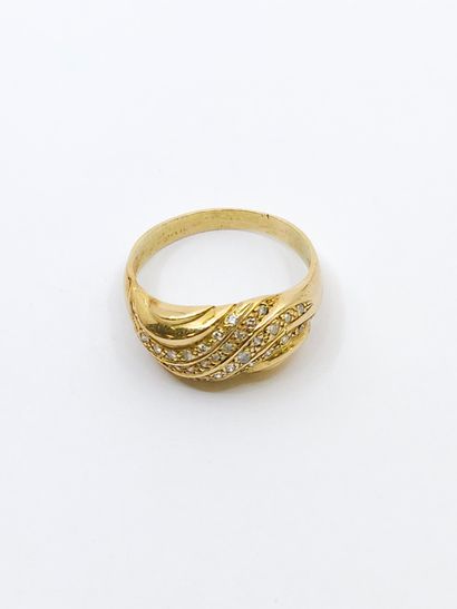 RING in 750° yellow gold set with thirty-five...