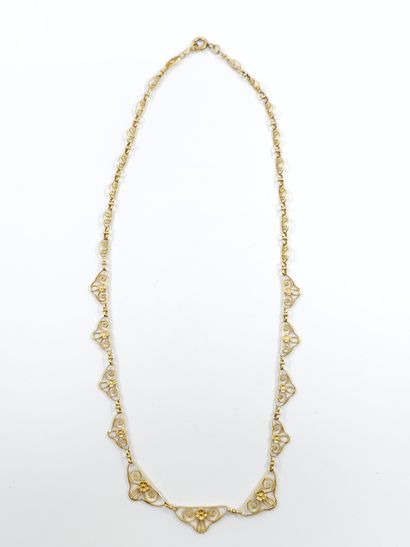 COLLIER en or jaune 750° filigrané
Poids...